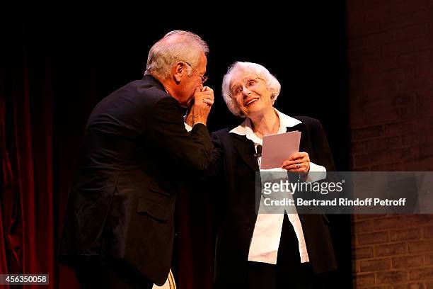 Stage Director of the event and Director of the Theatre Edouard VII, Bernard Murat recites lines with Gisele Casadesus as they attend the tribute to...