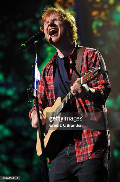 Ed Sheeran performs on stage during the iTunes Festival at The Roundhouse on September 29, 2014 in London, United Kingdom.