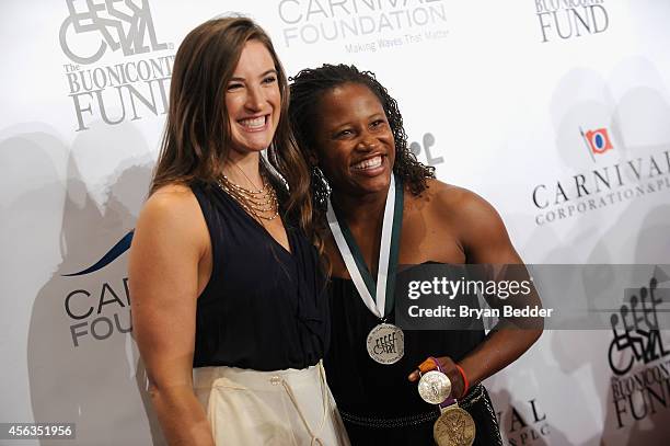 American skeleton racer Bree Schaaf and track and field athlete Lauryn Williams attend the 29th Annual Great Sports Legends Dinner to benefit The...