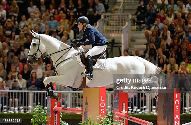 Rider Meredith Michaels-Beerbaum of Germany rides Fibonacci 17 during the Longines Grand Prix class as part of the Longines Los Angeles Masters at...