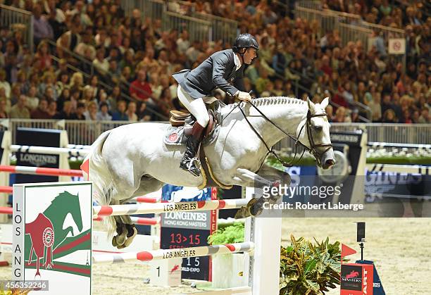 Rider Philippe Rozier of France rides Rahotep de Toscane during the Longines Grand Prix class as part of the Longines Los Angeles Masters at Los...
