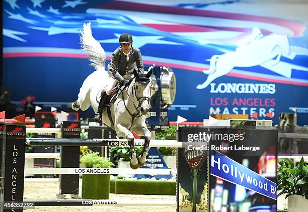 Rider Rodrigo Pessoa of Brazil rides Tinkabell 12 during the Longines Grand Prix class as part of the Longines Los Angeles Masters at Los Angeles...