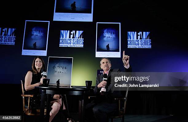 Author Gillian Flynn and NYFCS Host/ Rolling Stone Film Critic Peter Travers speak at the New York Film Critic Series Screening Of "Gone Girl" at AMC...