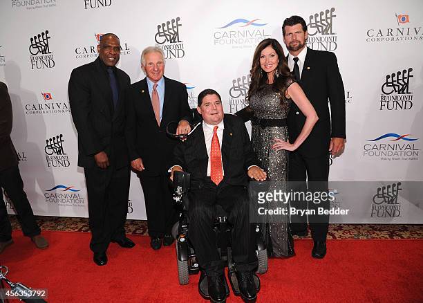 Former baseball player Andre Dawson, founder and CEO of The Buoniconti Fund Nick Buoniconti, President of the Buoniconti Fund Marc Buoniconti, Lisa...