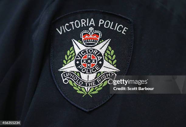 General view of a Victoria Police badge during a press conference about the terrorism raids that took place in Melbourne this morning at Victoria...