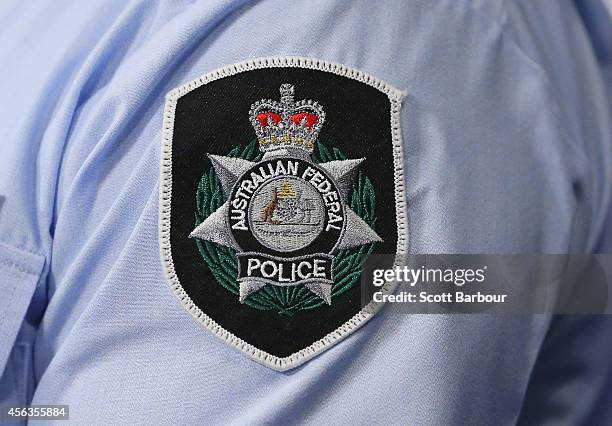 General view of the Australian Federal Police badge during a press conference about the terrorism raids that took place in Melbourne this morning at...