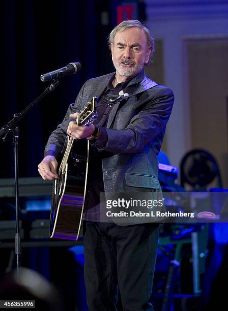 Musician Neil Diamond performs a special concert at Erasmus Hall High School, where he attended school over 50 years ago, on September 29, 2014 in...