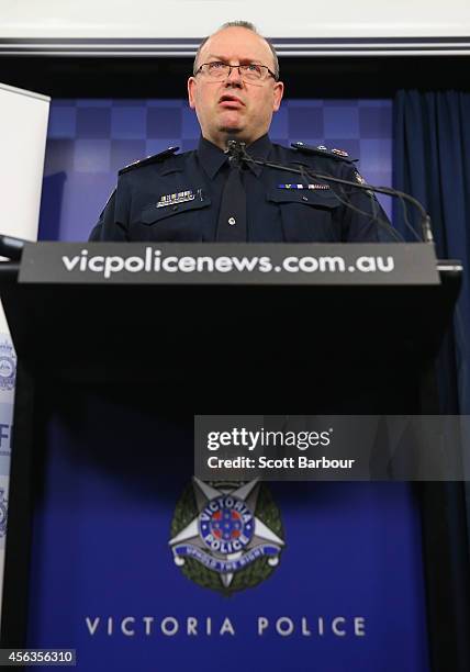 Victoria Police Deputy Commissioner Graham Ashton speaks to the media about the terrorism raids that took place in Melbourne this morning at Victoria...