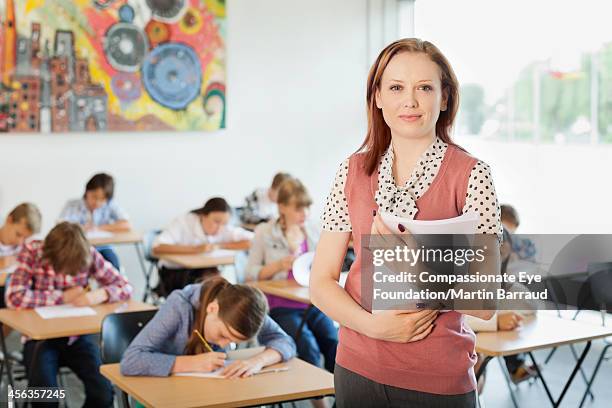 students taking test in classroom - educational establishment stock pictures, royalty-free photos & images