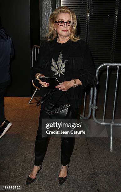 Catherine Deneuve attends the Saint Laurent fashion show at the Carreau du Temple as part of the Paris Fashion Week Womenswear Spring/Summer 2015 on...