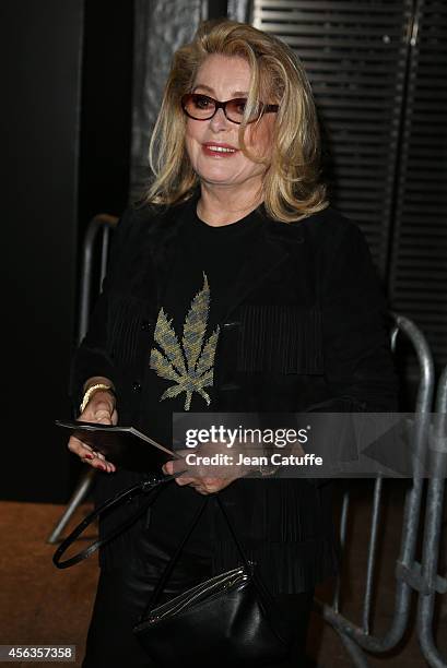 Catherine Deneuve attends the Saint Laurent fashion show at the Carreau du Temple as part of the Paris Fashion Week Womenswear Spring/Summer 2015 on...