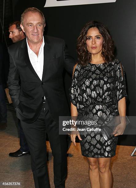 Salma Hayek and husband Francois-Henri Pinault attend the Saint Laurent fashion show at the Carreau du Temple as part of the Paris Fashion Week...