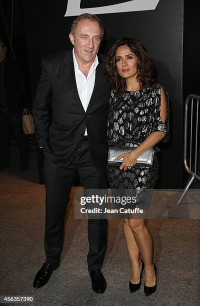 Salma Hayek and husband Francois-Henri Pinault attend the Saint Laurent fashion show at the Carreau du Temple as part of the Paris Fashion Week...