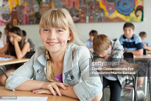 students taking test in classroom - banbossy stock pictures, royalty-free photos & images