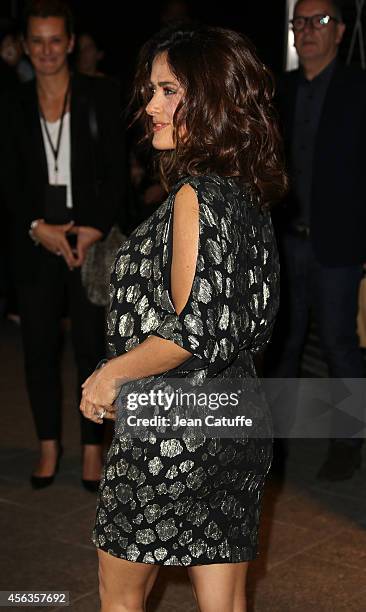 Salma Hayek attends the Saint Laurent fashion show at the Carreau du Temple as part of the Paris Fashion Week Womenswear Spring/Summer 2015 on...