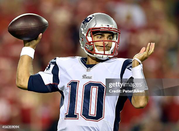 Jimmy Garoppolo of the New England Patriots passes against the Kansas City Chiefs during the second half at Arrowhead Stadium on September 29, 2014...