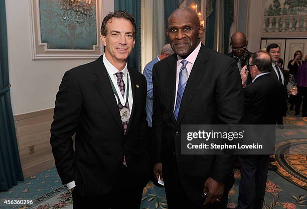 Former hockey player Joe Sakic and former football player Harry Carson attend the 29th Annual Great Sports Legends Dinner to benefit The Buoniconti...