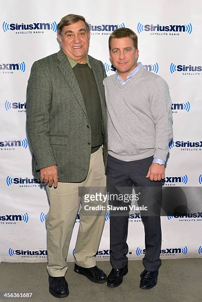 Actor Dan Lauria and actor/producer Peter Billingsley visit SiriusXM Studios on December 13, 2013 in New York City.