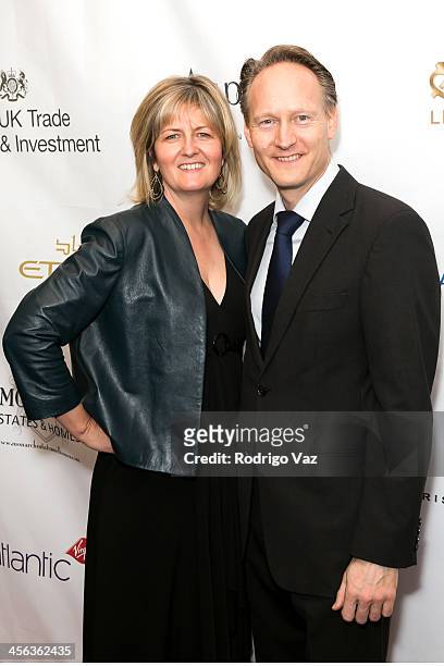 British Consul-General Christopher O'Connor and Martha Nelems attend The British American Business Council Los Angeles 54th Annual Christmas Luncheon...