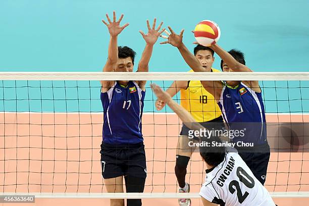 Alex Chan of Hong Kong spikes against Myanmar during the Indoor Volleyball Mens semi-final match between Hong Kong and Myanmar during day eleven of...