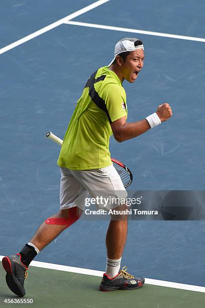 Tatsuma Ito of Japan celebrates after winning the men's singles first round match against Stan Wawrinka of Switzerland on day two of Rakuten Open...