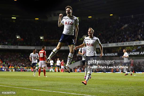 Ryan Mason of Tottenham Hotspur celebrates scoring the equalising goal during the Capital One Cup Third Round between the Tottenham Hotspur and...