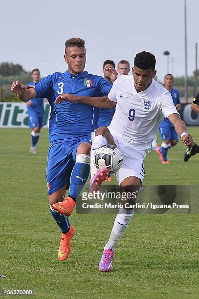 Dominic Solank of England U 18 competes the ball with Federico Dimarco of Italy U 18 during the international friendly match between Italy U18 and...