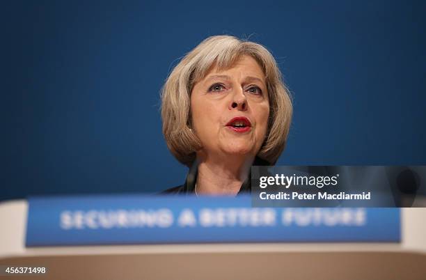 Home Secretary Theresa May addresses the Conservative party conference on September 30, 2014 in Birmingham, England. The third day of conference will...