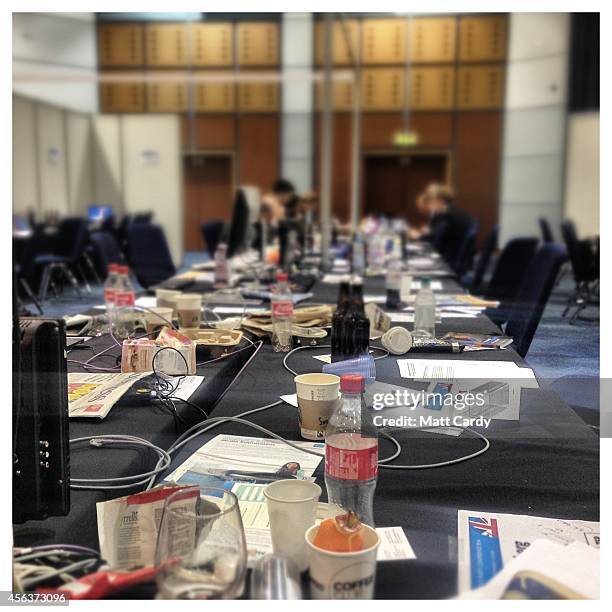 Papers and clutter is left on desks in the press room at the ICC Birmingham which is hosting the 2014 Conservative Party Conference on September 29,...