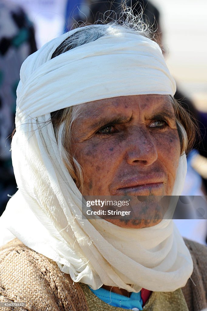 Syrian Kurds Fleeing The Islamic State Militants Cross Into Turkey