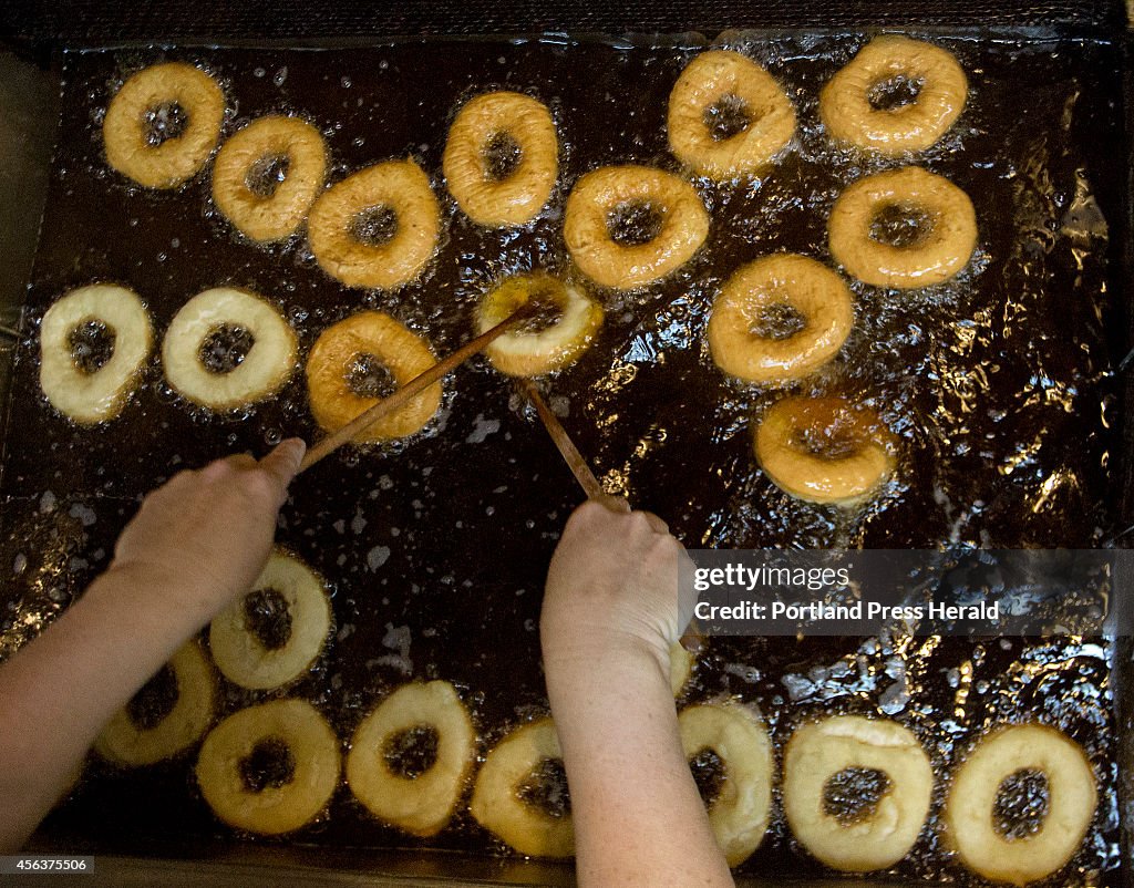 Making donuts at The Holy Doughnut
