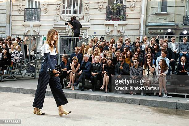 Model Caroline de Maigret walking the runway front of Anna Wintour, Baz Luhrmann, his wife Catherine Martin, Astrid Berges-Frisbey, guest, Xavier...