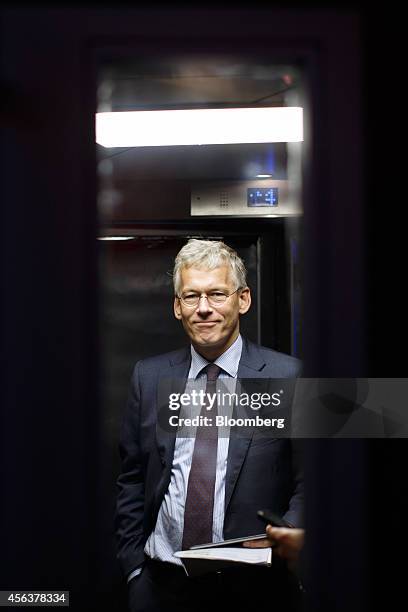 Frans van Houten, chief executive officer of Royal Philips NV, arrives in an elevator to deliver a keynote speech during the company's innovation day...