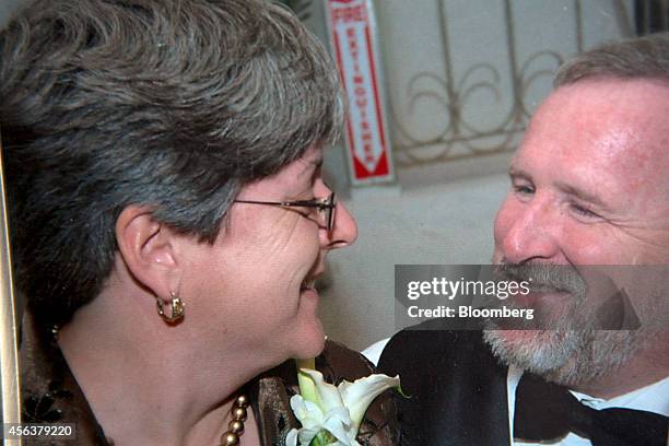 Family photograph of Susan and Ed Slattery is displayed in the Slattery home in Timonium, Maryland, U.S., on Monday, Aug. 11, 2014. Susan Slattery...