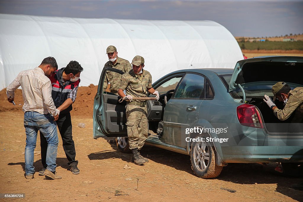 Syrian Kurds Fleeing The Islamic State Militants Cross Into Turkey