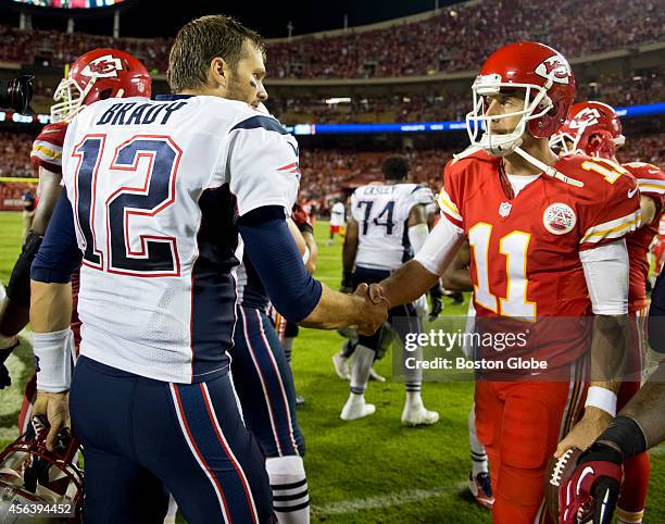 New England Patriots quarterback Tom Brady shakes hands with Kansas City Chiefs quarterback Alex Smith after the Chiefs defeated the Patriots 41-14...