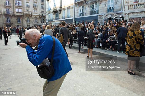 Photographer Bill Cunningham is seen working before the Chanel show at the Grand Palais as part of Paris Fashion Week Womenswear Spring/Summer 2015...