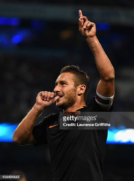 Francesco Totti of AS Roma celebrates scoring his team's first goal during the UEFA Champions League Group E match between Manchester City FC and AS...