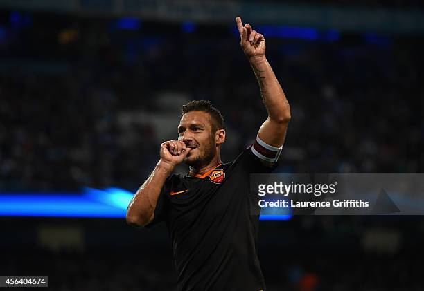 Francesco Totti of AS Roma celebrates scoring his team's first goal during the UEFA Champions League Group E match between Manchester City FC and AS...