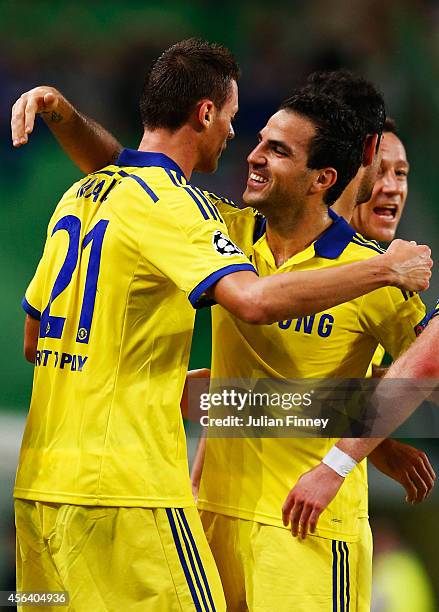 Nemanja Matic of Chelsea celebrates with team mate Cesc Fabregas as he scores their first goal during the UEFA Champions League Group G match between...