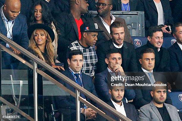Beyonce, Jay-Z and David Beckham watch the action during the Group F UEFA Champions League match between Paris Saint-Germain v FC Barcelona held at...