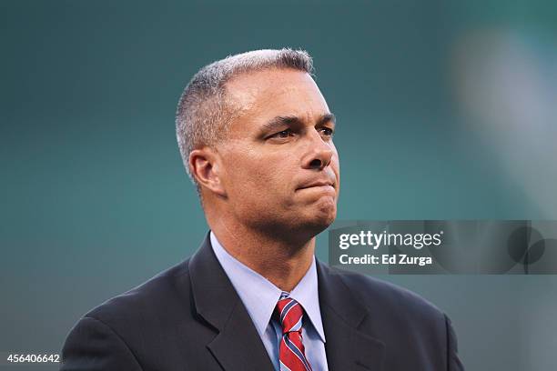 Kansas City Royals general manager Dayton Moore looks on prior to a game between the Detroit Tigers and Kansas City Royals at Kauffman Stadium on...