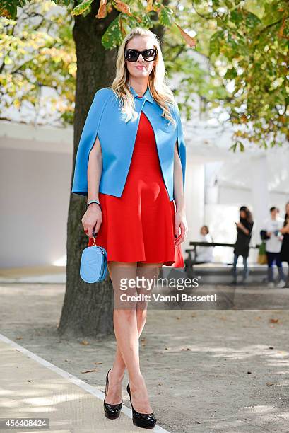 Niki Hilton poses wearing Valentino after the Valentino show on September 30, 2014 in Paris, France.