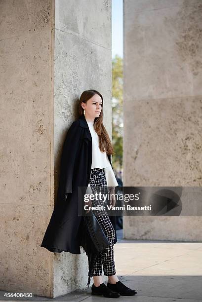 Lea Gobin poses wearing Musette shoes on September 30, 2014 in Paris, France.