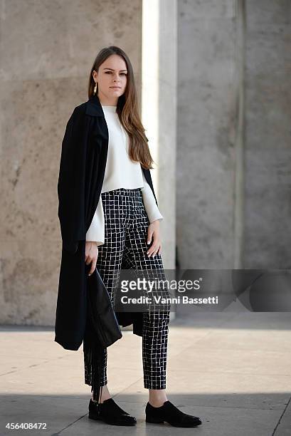 Lea Gobin poses wearing Musette shoes on September 30, 2014 in Paris, France.