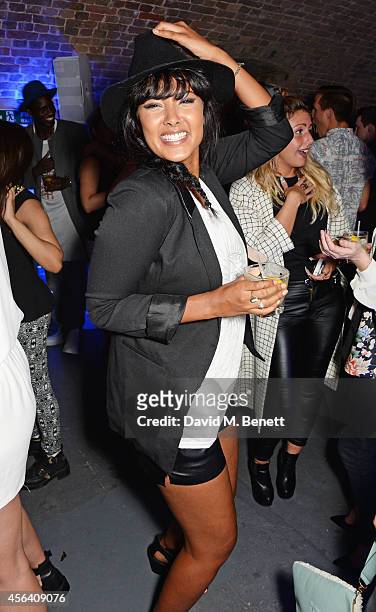 Maya Jama attends the Disaronno Wears Versace limited edition bottle launch at One Mayfair on September 30, 2014 in London, England.
