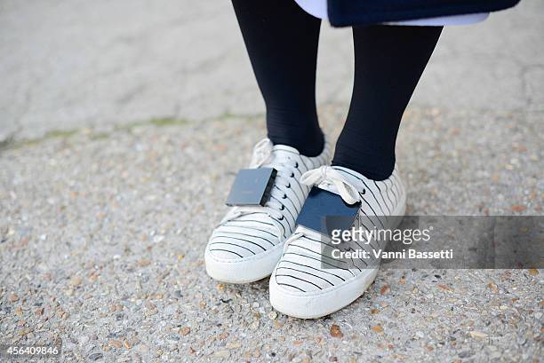 Designer Kirsty Ward poses wearing a Acne shoes on September 30, 2014 in Paris, France.