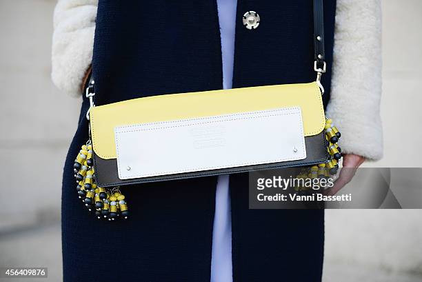 Designer Kirsty Ward poses wearing a Kirsty Ward coat and bag on September 30, 2014 in Paris, France.