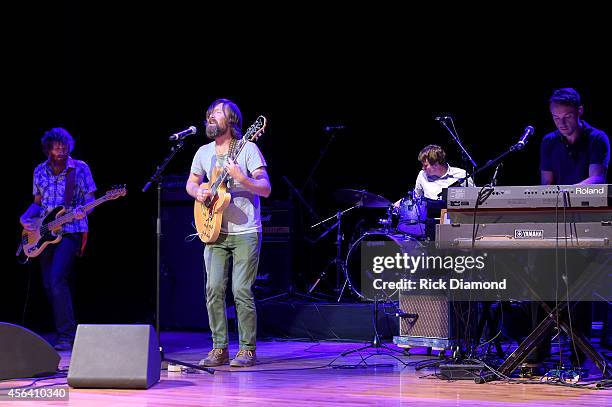 Roger Dabbs, Matthew Pelham, Rollum Haas, and Mark Bond of The Features perform onstage during Day 4 of the IEBA 2014 Conference on September 30,...