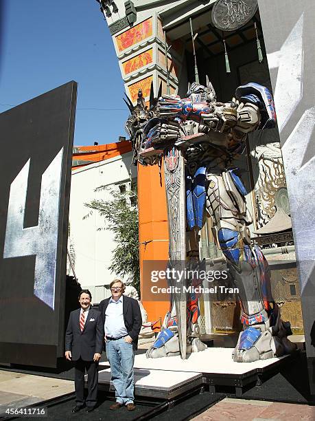 Peter Cullen the voice of Optimus Prime and Lorenzo di Bonaventura attend the Transformer Optimus Prime hand/footprint ceremony held at TCL Chinese...